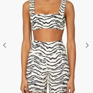 We wore what tiger biker shorts & top NWT